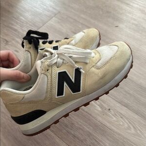 New Balance Cream and Black Sneakers